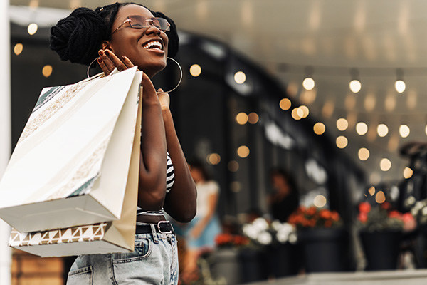 https://www.miamilakes-fl.gov/our-community/visitors-guide/beautiful-african-woman-in-the-mall-with-shopping-bags-happy-woman-doing-christmas-shopping/