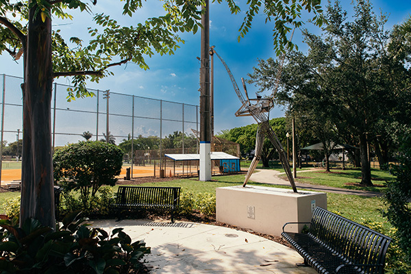 Baseball field and statue at local park